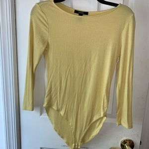 Baby yellow body suit